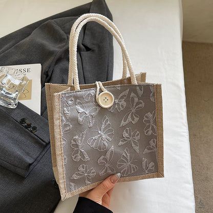 Schmetterling bestickte Stofftasche