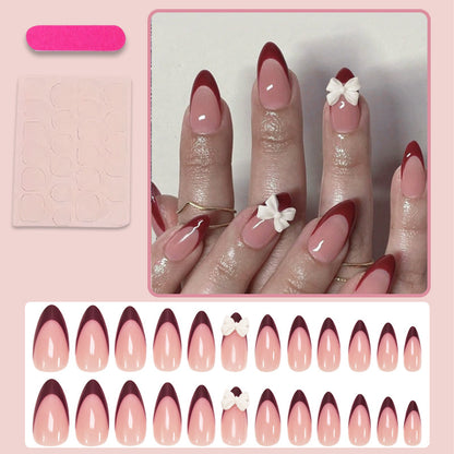 Kunstnagelset mit elegantem Spitzen-Design und romantischen Schleifen Brehn
