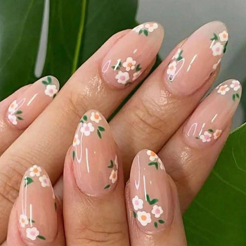 Kunstnagelset mit romantischen Blumendesigns Brehn