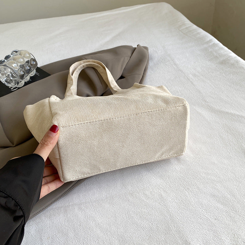 Texturierte Cordura-Tote-Tasche mit niedlichem Plüsch-Anhänger
