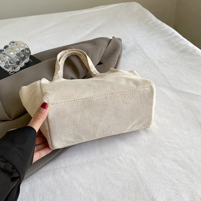 Texturierte Cordura-Tote-Tasche mit niedlichem Plüsch-Anhänger