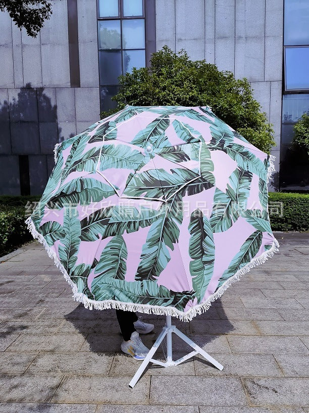 Damen Sonnenschirm mit tropischem Blattdesign und Quastenverzierung Brehn