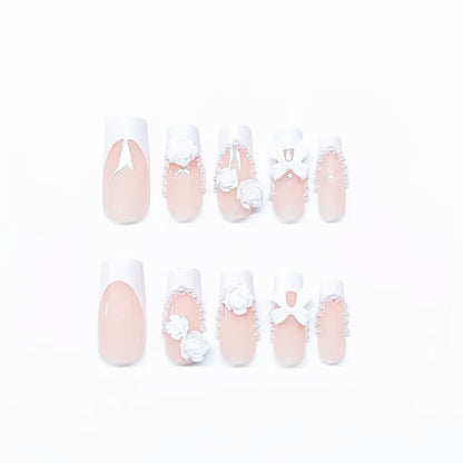 Kunstnagelset mit eleganten 3D-Blüten- und Perlverzierungen Brehn