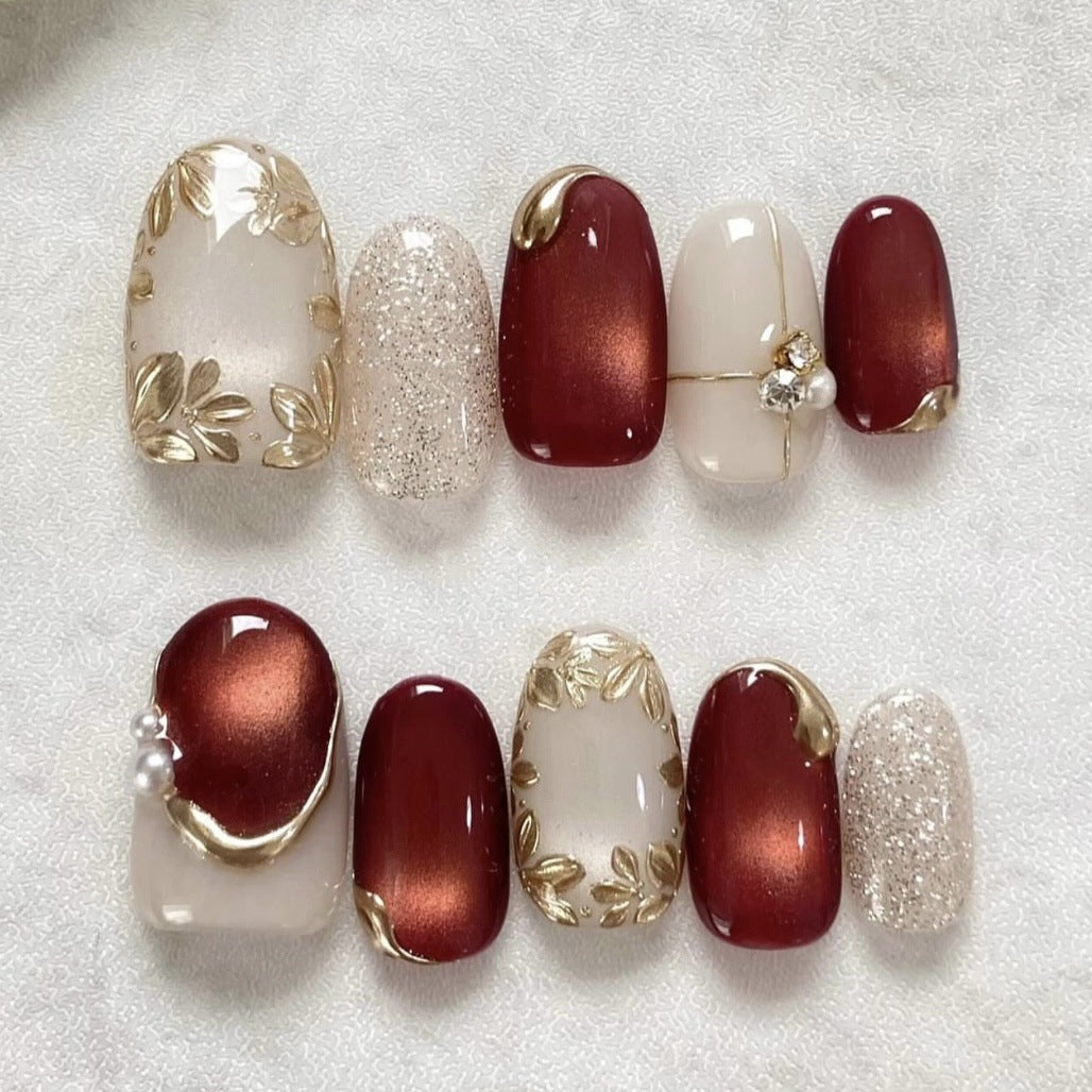 Kunstnägel mit elegantem Goldakzent Brehn