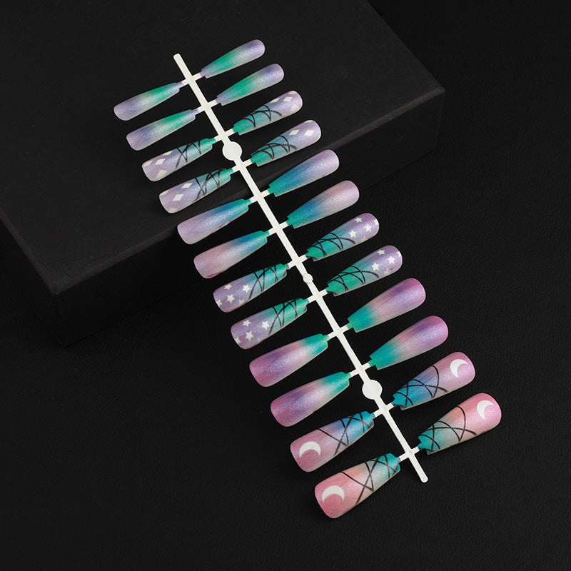 Kunstnägel mit Sternen- und Mond-Design Brehn