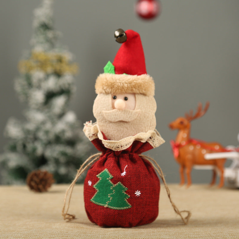 Niedlicher Weihnachtsgnom mit Geschenkesack Brehn