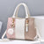 Elegante Mehrfarbige Handtasche Brehn