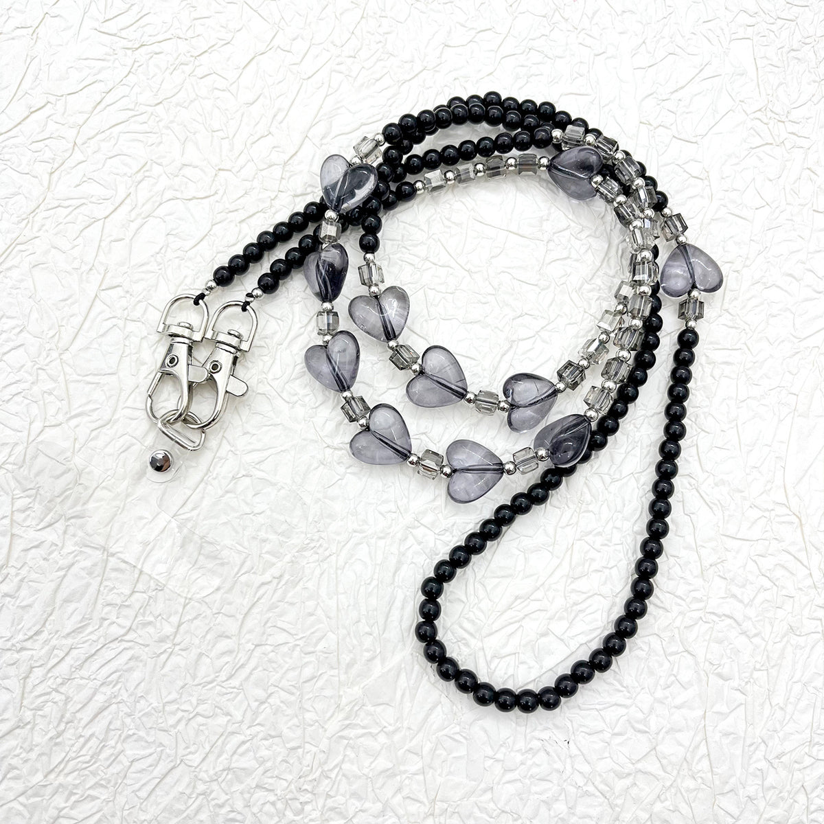 Perlen-Brillen-Kette mit stylischem Karomuster Brehn