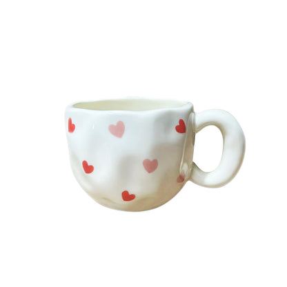 Keramik-Tasse mit handbemaltem Tulpenmuster und organischer Form