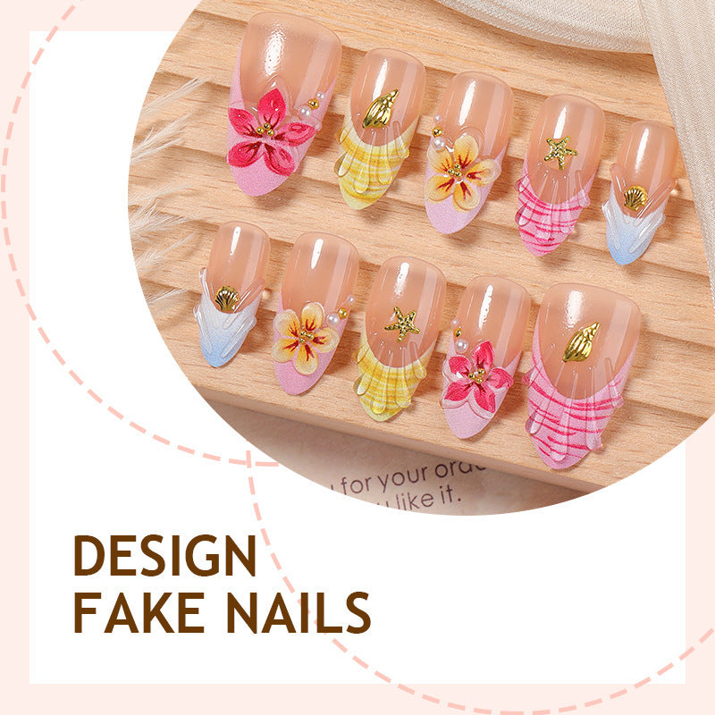 Kunstnagelset mit farbenfrohen Blütenmotiven und Glitzerdetails Brehn