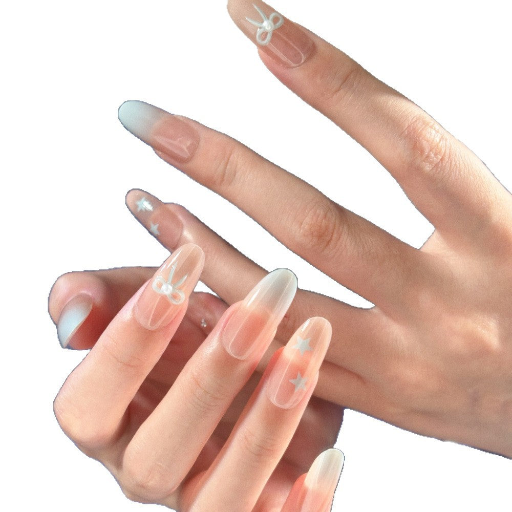 Glamouröse Ombre Press-On Nagelset mit dekorativen Stern- und Schleifenakzenten Brehn