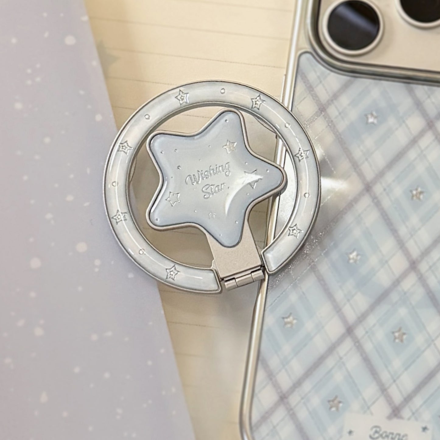 Verspielter Smartphone Fingerhalter im Sternendesign Brehn