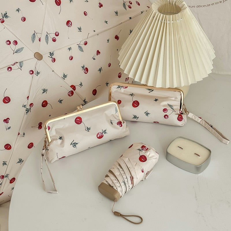 Damen eleganter Faltregenschirm mit floralem Design und praktischem Etui Brehn