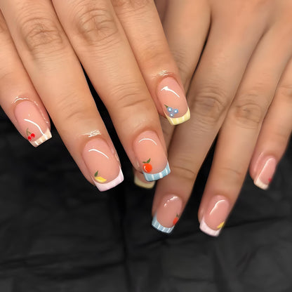 Kunstnagelset mit fröhlichen Obst-Designs und bunten Akzenten Brehn