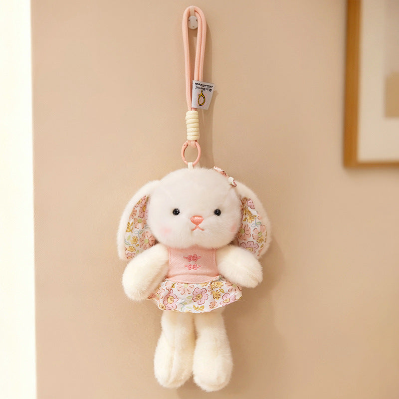 Plüsch Hase Taschenanhänger Schlüsselanhänger mit dekorativem Bogen und floralem Kleid Brehn