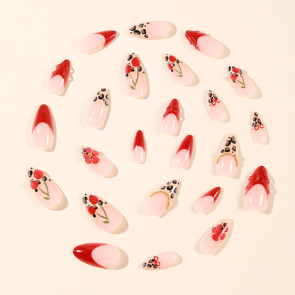 Künstlerische Leopard- und Blumen-Stiletto-Nagelkunst-Erweiterungen Brehn