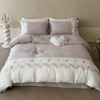 Luxuriöses besticktes Satin-Bettwäscheset mit Rüschensaum
