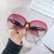 Damen oversized Sonnenbrille mit glamourösem Design Brehn