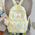Niedlicher Charakterdesign Blumen-Schulrucksack