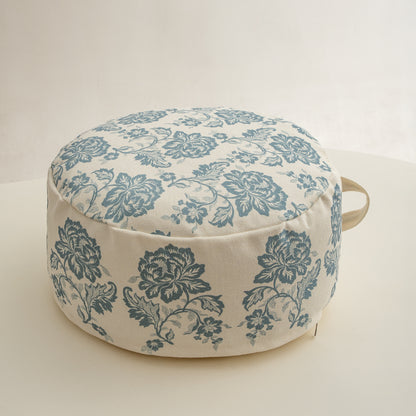 Runder Sitzpouf mit floraler Jacquard-Webung, stabilem Polsterkern und Tragegriff Brehn