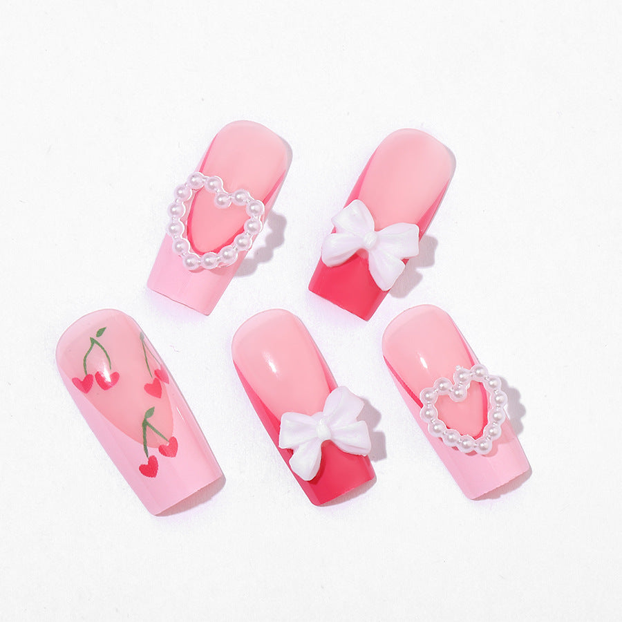 Dekoratives Press-On Nail Art Set mit 3D Herz- und Schleifenakzenten Brehn