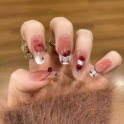 Niedliche themenbezogene Press-On Nagelkunst
