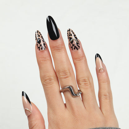 Künstlerische Stiletto-Nagelerweiterungen mit Animal-Print-Design Brehn
