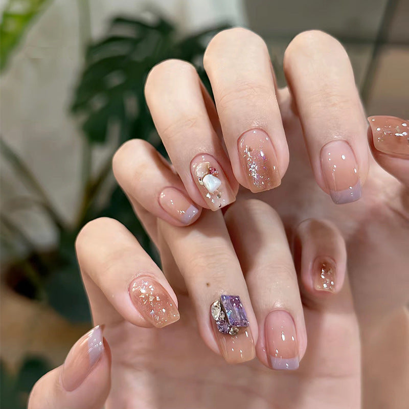 Elegante Press-On-Nagel-Set mit künstlerischem Glitter und dekorativen Akzenten Brehn