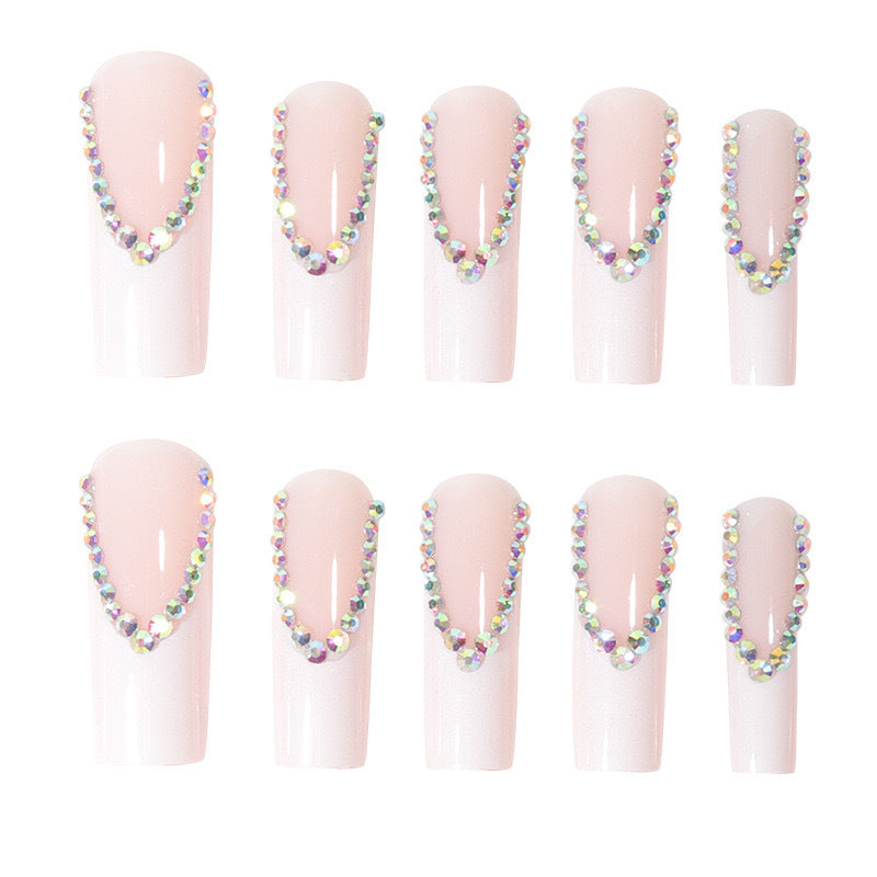 Kunstnagelset mit glamourösen Strass- und eleganten Spitzenverzierungen Brehn