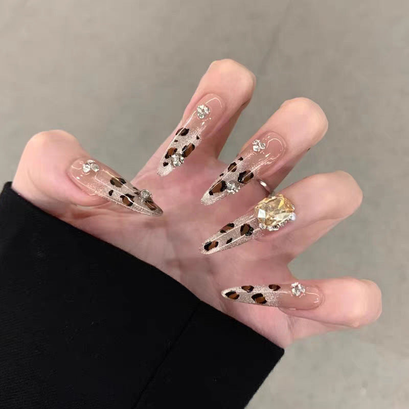 Künstlerisches Langes Stiletto Press-On Nagelset mit Schleife und Edelsteinakzenten Brehn