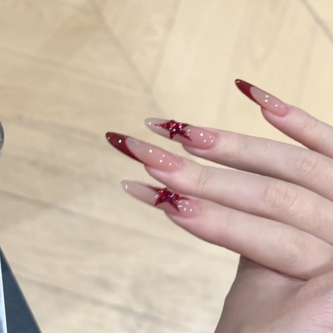 Kunstnägel mit Glitzerstern-Design Brehn