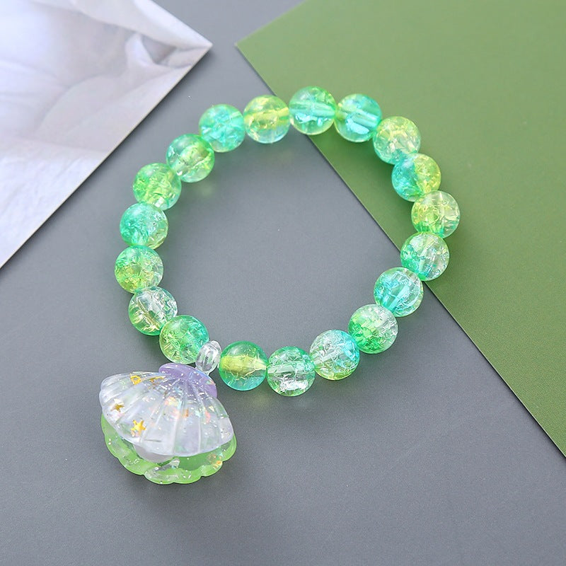 Verspieltes Armband mit Muschel-Anhänger Brehn