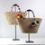 Geflochtene Strandtasche mit Dekorativen Pompons Brehn