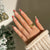 Kunstvolle Nagelkunst mit Blumenakzenten Brehn