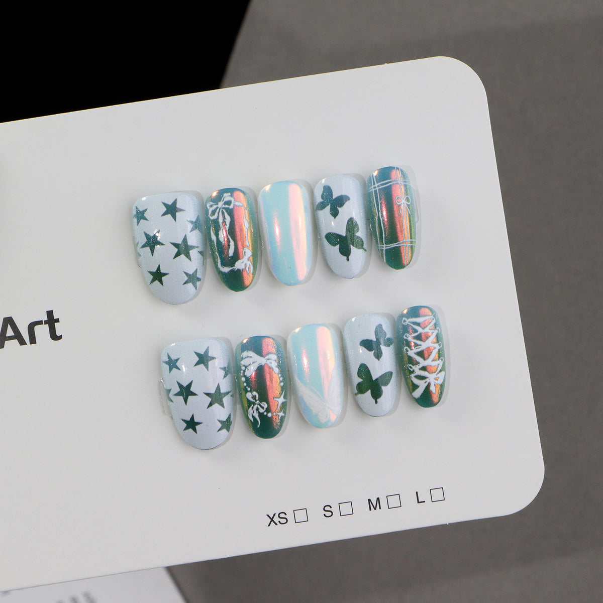 Dekoratives Press-On Nagelkunst-Set mit Schmetterlings- und Sternmustern Brehn