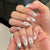 Premium dekorative Press-On-Nagelset mit floralen Akzenten Brehn
