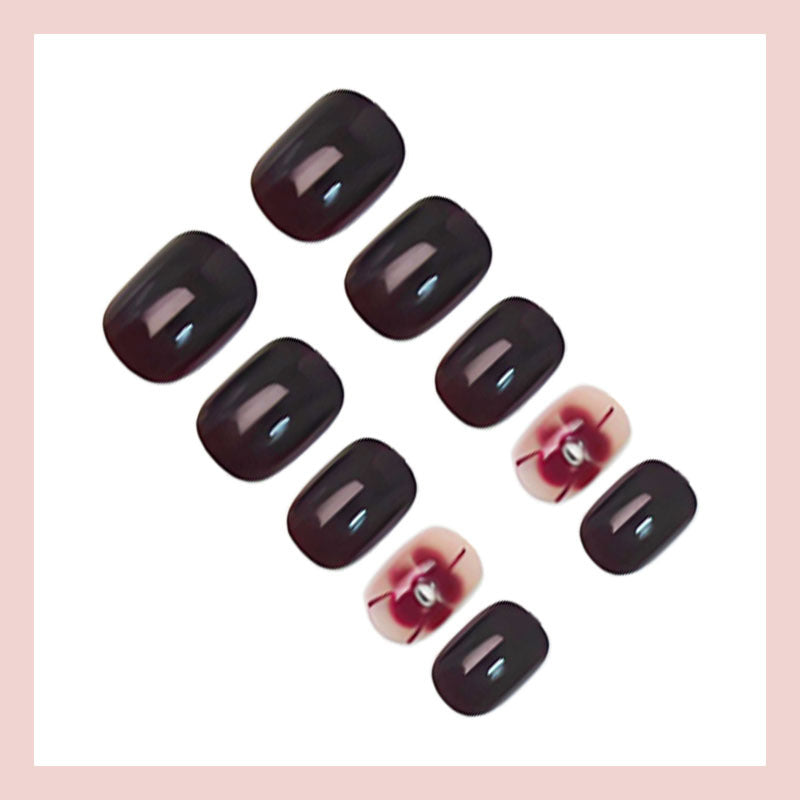 Kunstnagelset mit eleganten Blumendekoren Brehn