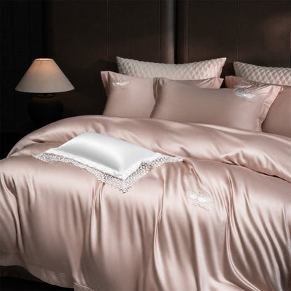 Luxuriöse Satin-Bettwäschegarnitur mit besticktem Schwanenmotiv und Spitzenkissen