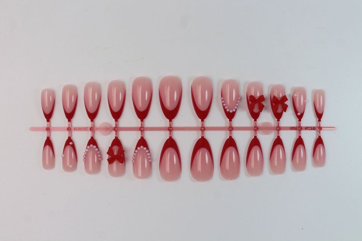 Kunstnagelset mit hochwertigem Schleifen- und Perlendesign Brehn