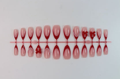 Kunstnagelset mit hochwertigem Schleifen- und Perlendesign Brehn