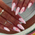 Blumenverzierte Stiletto Press-On Nagelkunst Brehn