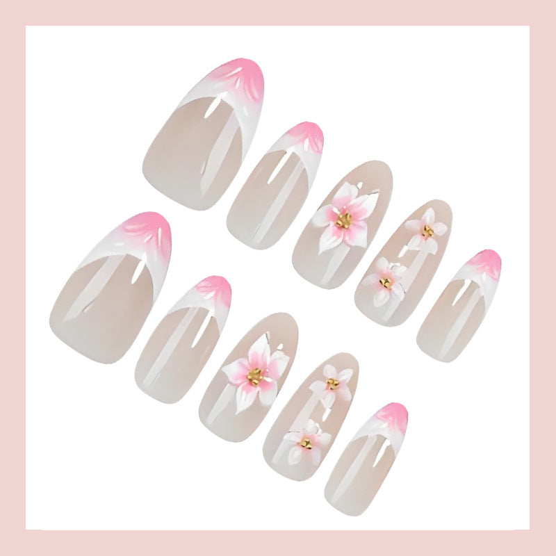 Kunstnagelset mit romantischen Blumen- und Ombre-Effekten Brehn