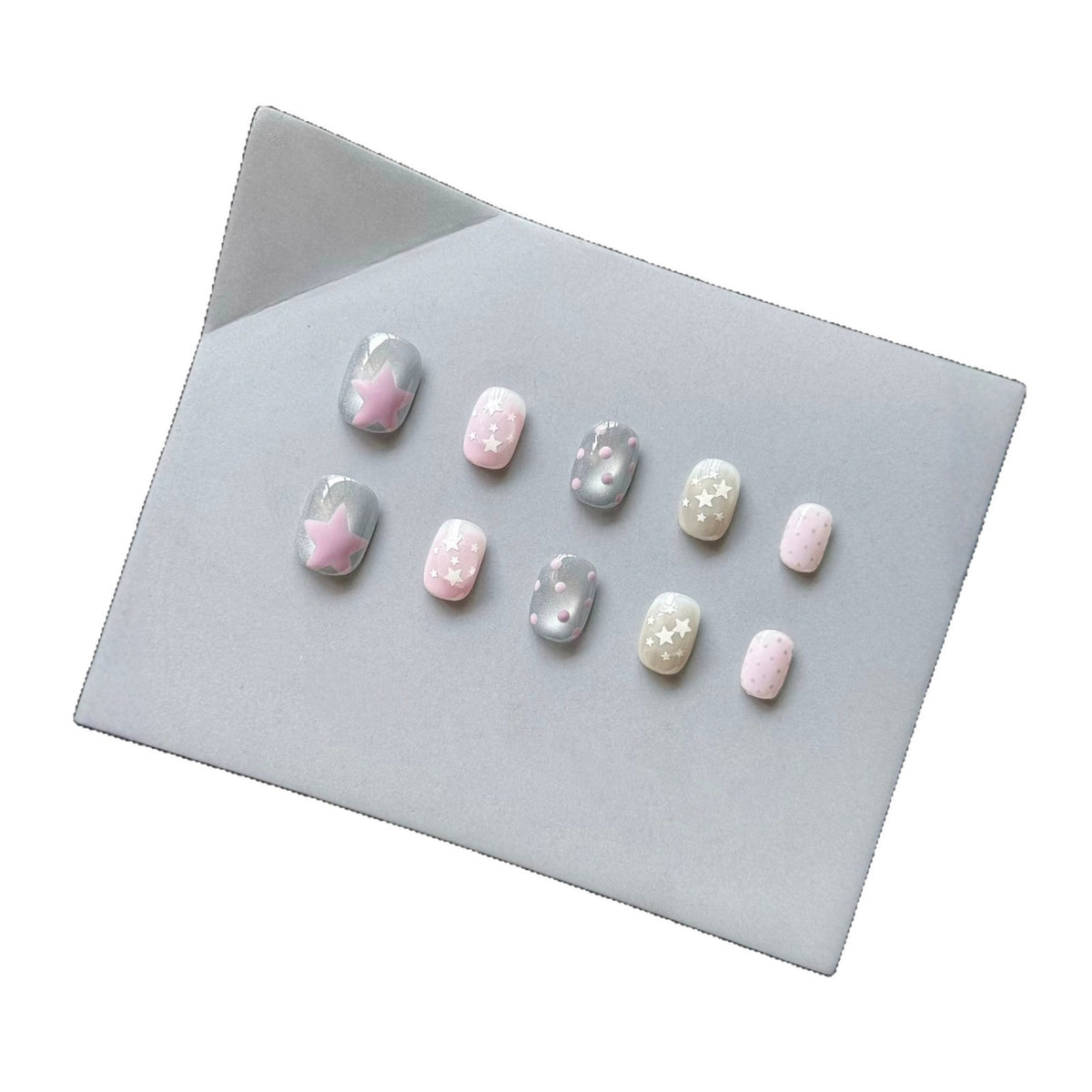Dekoratives Press-On Nagelkunstset mit himmlischem Thema