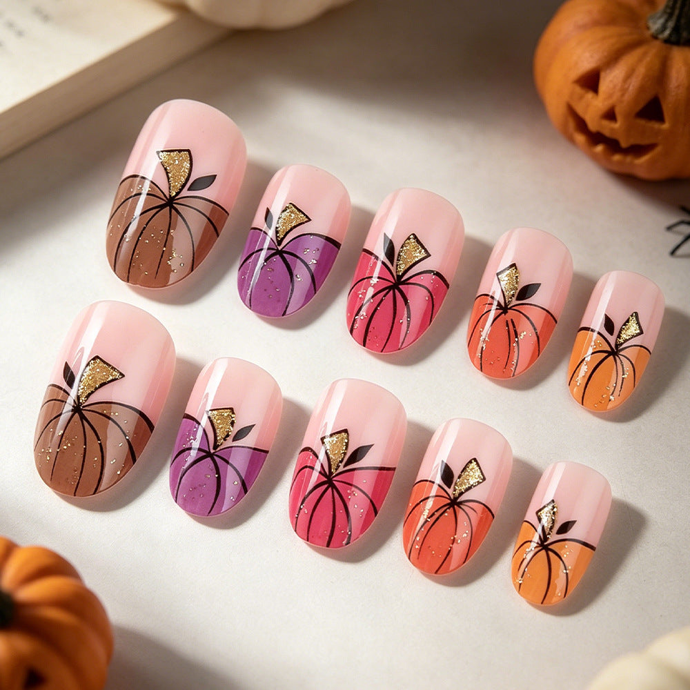 Künstlerisches Press-On Nagelkunst Set mit Kürbisdesign Brehn