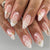 Dekoratives Nagelkunst Press-On Set mit floralen und goldenen Akzenten Brehn