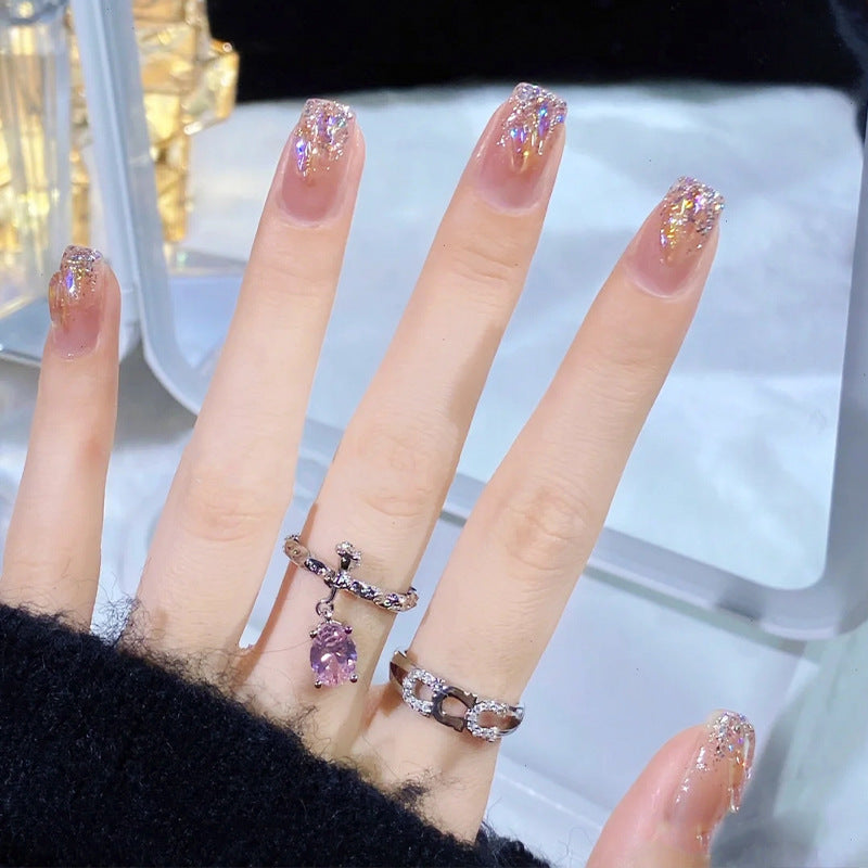 Kunstnagelset mit glitzernden holografischen Akzenten Brehn