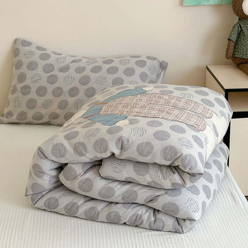 Kinder-Steppbett-Garnitur mit appliziertem Hunde-Motiv und Tupfenmuster