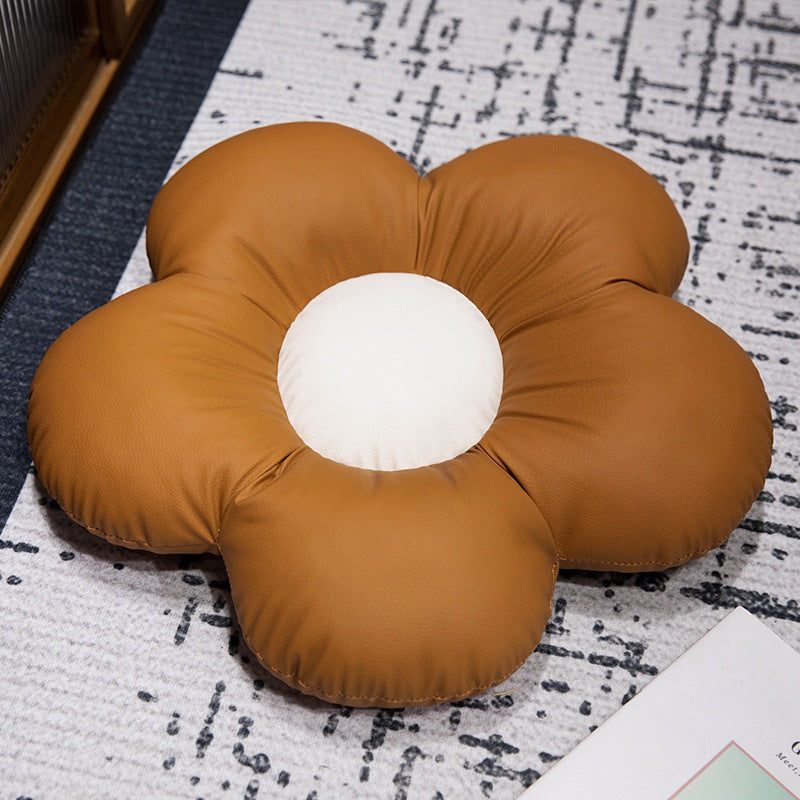 Gepolstertes Sitzkissen in Blumenform mit Kunstleder‑Mittelstück und flauschiger Randpolsterung