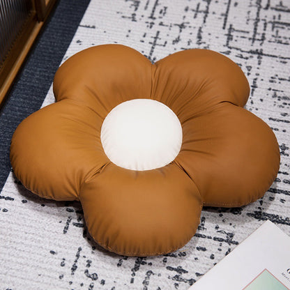 Gepolstertes Sitzkissen in Blumenform mit Kunstleder‑Mittelstück und flauschiger Randpolsterung