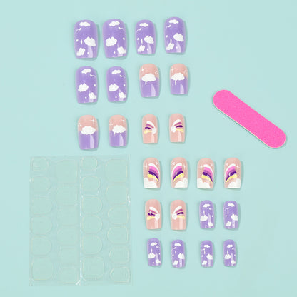 Kreatives Nail Art Set mit bunten Regenbogen- und Wolkenmotiven Brehn